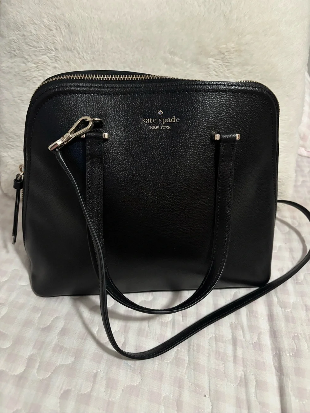 kate spade black leather satchel with gold-tone logo